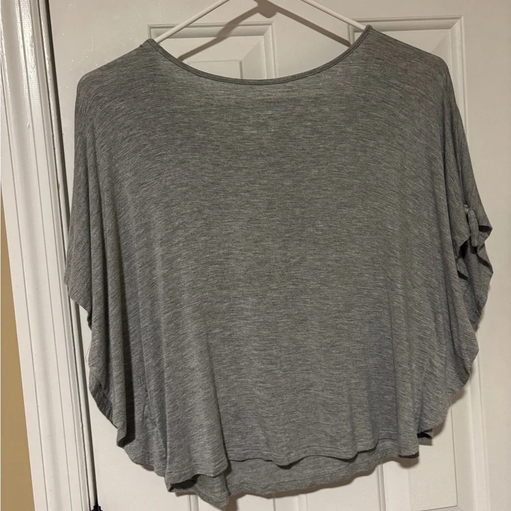 Beautiful Justice top with white decorative detail